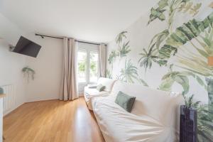 Appartements Studio - 2 min gare - 10 min Disney : photos des chambres