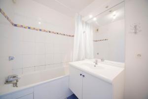 Appartements PARIS/DISNEY 50m2 - 10min de Disney - L'Aviateur : photos des chambres