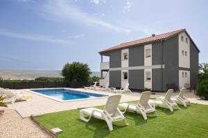 Apartments Zanic with private swimming pool and sea view
