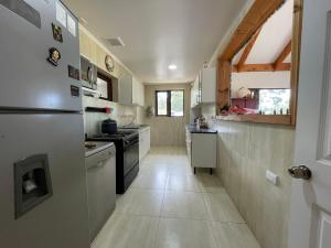 Casa con excelentes 2 habitaciones 1 Doble Matrimonial y otra 2 camas indiv con vista al volcán, Puerto Varas