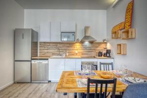 Appartements Le Family's 39 - CHU : photos des chambres
