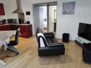 Appartements Comme chez soi : photos des chambres