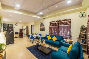 The Banyan Tree Adobe