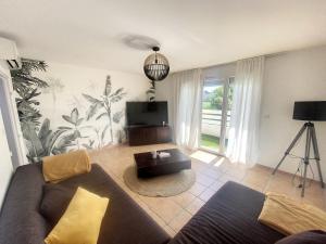 Appartements ღ Les Oliviers • Piscine, Parking et Climatisation : photos des chambres