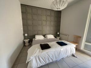 Appartements Les Arenes : photos des chambres