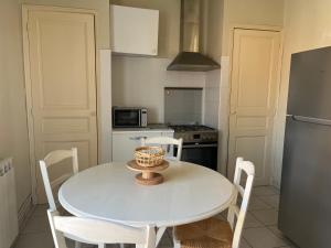 Appartements Les Arenes : photos des chambres