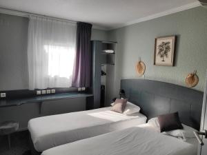 Hotels Kyriad Direct Arles : Chambre Lits Jumeaux