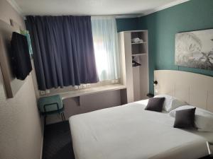 Hotels Kyriad Direct Arles : photos des chambres
