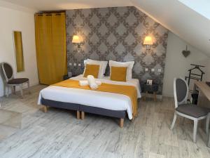 Hotels Hotel The Originals Le Manoir de Pierre Levee : photos des chambres