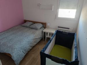 Appartements T3 cosy face a l'Hortus : photos des chambres