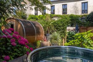 Maisons de vacances Escale Rochelaise, gite urbain avec SPA bain nordique et sauna tonneau : photos des chambres