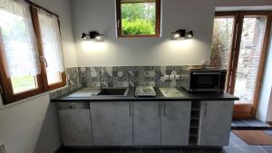 Maisons de vacances Le Jardin des Murmures : photos des chambres