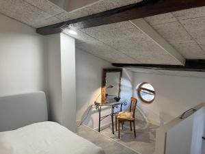 Appartements LOFT HOLIDAY Location Vacances a Pinet : photos des chambres