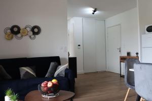 Appartements Logement chaleureux et central : photos des chambres