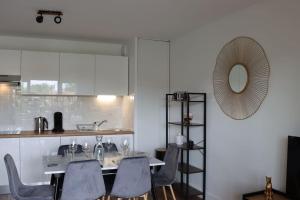 Appartements Logement chaleureux et central : photos des chambres