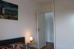 Appartements Logement chaleureux et central : photos des chambres