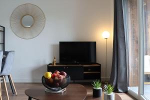 Appartements Logement chaleureux et central : photos des chambres