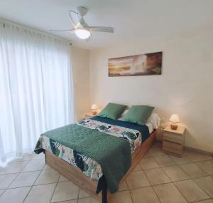 Appartements T2 CALME + cadre verdoyant : photos des chambres