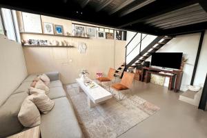 Maisons de vacances Loft familial avec grand jardin verdoyant : photos des chambres