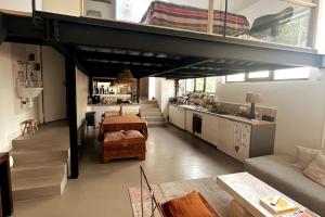 Maisons de vacances Loft familial avec grand jardin verdoyant : photos des chambres