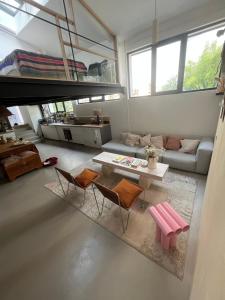 Maisons de vacances Loft familial avec grand jardin verdoyant : photos des chambres