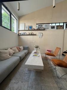 Maisons de vacances Loft familial avec grand jardin verdoyant : photos des chambres