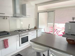 Appartements T3 cosy a 9 min Eurexpo et du groupama stadium : photos des chambres