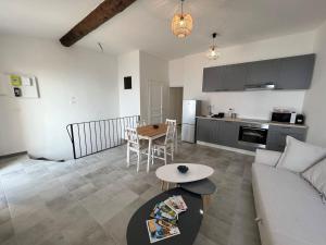 Appartements Au coeur du village , vue mer : photos des chambres