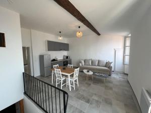 Appartements Au coeur du village , vue mer : photos des chambres