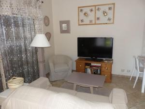 Maisons de vacances Maison independante climatisee dans quartier calme : photos des chambres