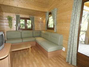 4-8 person chalets on a nice holiday park in the middle of the Pyrenees : photos des chambres