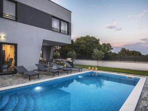 Modern villa with heated swimming pool and fenced garden