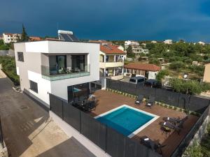 Luxury villa with private heated pool and sea view, only 100m from the beach