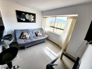 Apartamento con Parqueadero y Vista a la Ciudad - América