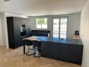 Les appartements du Carnot - Terrasses et Jardins : photos des chambres