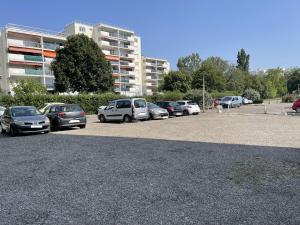 Appartements T3 cosy a 9 min Eurexpo et du groupama stadium : photos des chambres