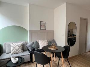 Appartements La Capsule - Appartement Design et Cosy : photos des chambres