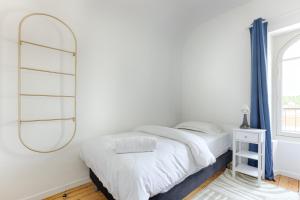 Appartements Le Magnolia - A 10 minutes de Disneyland : photos des chambres