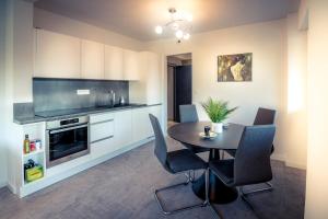 Appartements Golden Beach parking proche du lac : photos des chambres