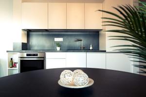 Appartements Golden Beach parking proche du lac : photos des chambres