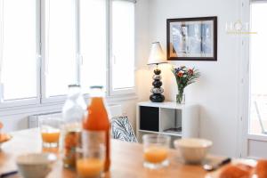 Appartements Logement agreable avec emplacement ideal au coeur des Sables : photos des chambres