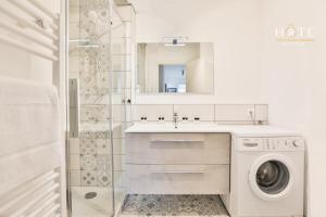 Appartements Logement agreable avec emplacement ideal au coeur des Sables : photos des chambres