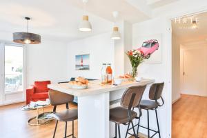 Appartements Logement agreable avec emplacement ideal au coeur des Sables : photos des chambres