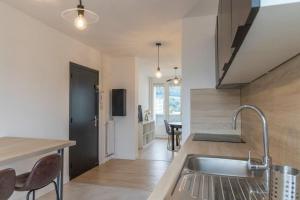 Appartements Le Camille YourHostHelper : photos des chambres