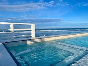 REEF HOUSE BACNOTAN White sand beach front with Private Swimming pool