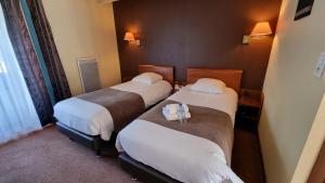 Hotels Logis L'Abreuvoir : photos des chambres