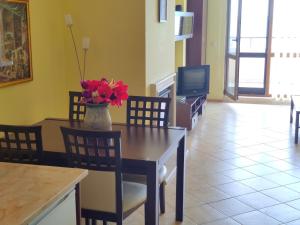 SUN AND FLOWERS APARTMENTS in front of the sea