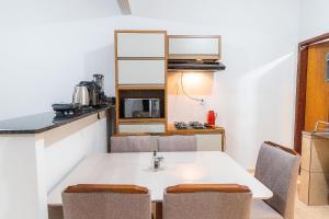 Apartamentos 2 qtos Csuite ,Cozinha Completa, Wi-Fi 1GIga, Jr Catito