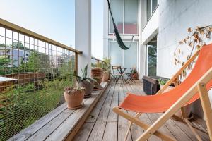 Appartements Calme et verdure: vue montagne - terrasse - wifi : photos des chambres