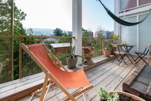 Appartements Calme et verdure: vue montagne - terrasse - wifi : photos des chambres